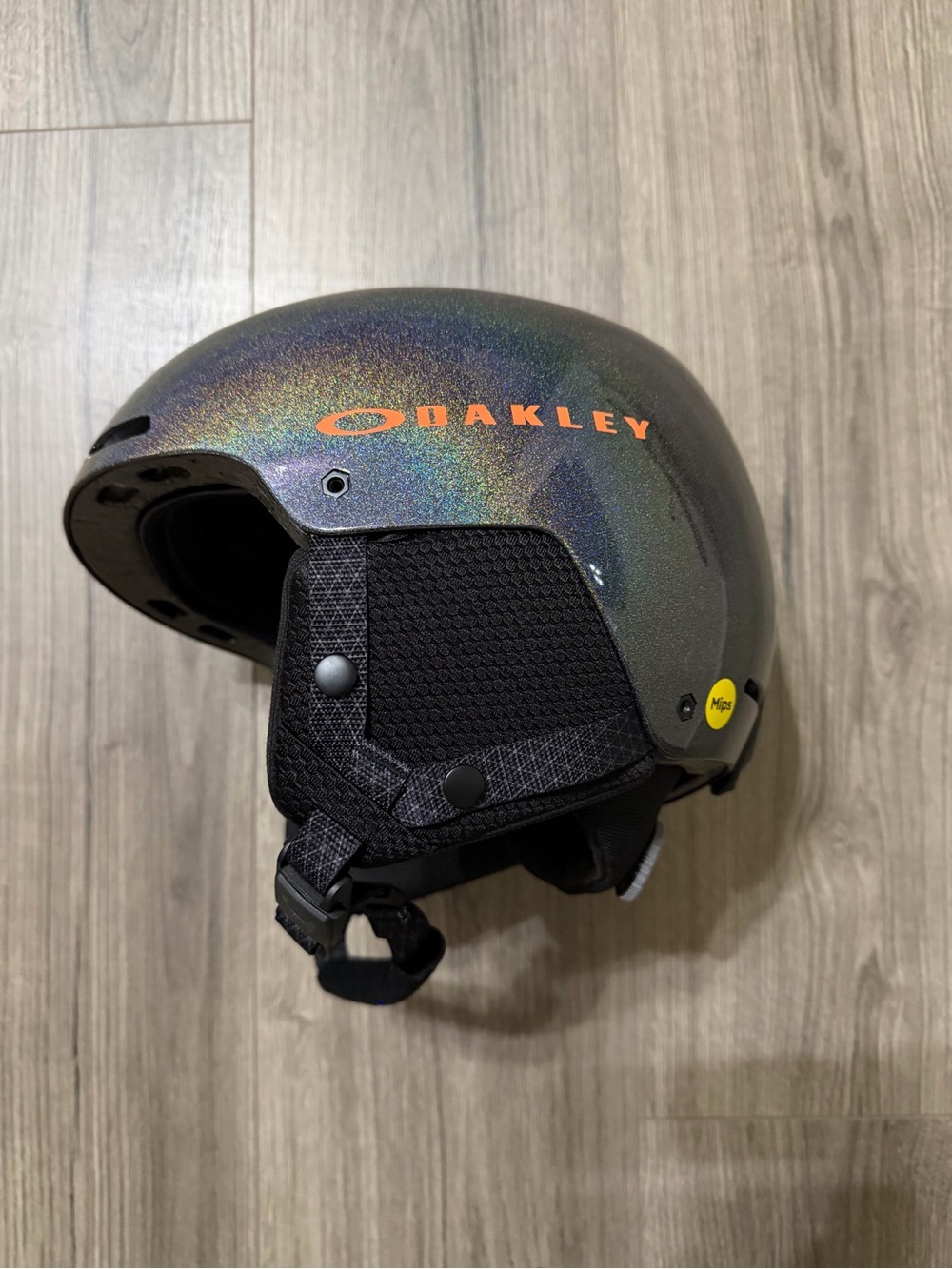 Oakley Iridescent Gray Ski Helmet with Orange Logo